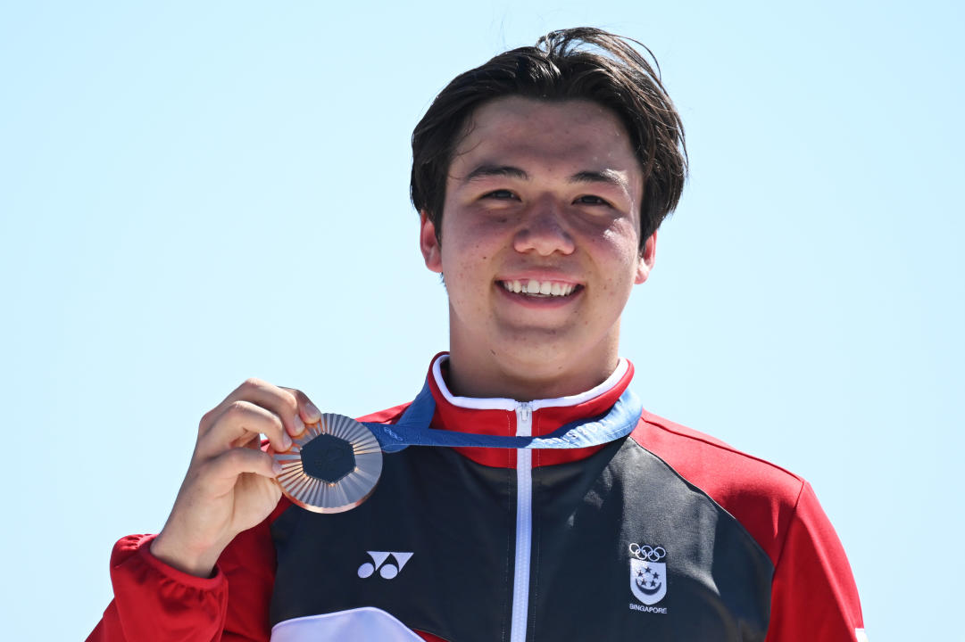 MARSEILLE, FRANCE - AUGUST 09: Bronze medalist Maximilian Maeder of Team Singapore celebrates at the medal ceremony for the Men's Kite on day fourteen of the Olympic Games Paris 2024 at Marseille Marina on August 09, 2024 in Marseille, France. (Photo by Clive Mason/Getty Images)