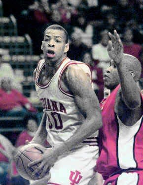 Indiana\'s William Gladness is hounded by Ball State\'s Wayne Johnson in the Hoosiers\' 72-62 win in the Hoosier Classic finals on Monday at Market Square Arena in Indianapolis. Staff photo by David Snodgress