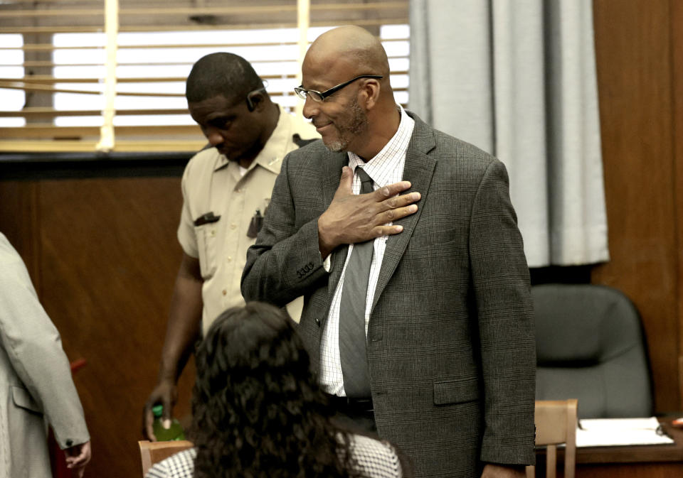 FILE - Christopher Dunn arrives in court, May 21, 2024, at the Carnahan Courthouse in St. Louis. A St. Louis judge is now deciding the fate of Christopher Dunn, who has been imprisoned more than three decades for a murder he says he didn't commit. St. Louis Circuit Attorney Gabe Gore believes him, and requested the hearing to determine if Dunn's conviction should be vacated. It isn't clear when Judge Jason Sengheiser will issue a ruling. The two-day hearing concluded Wednesday, May 22, 2024. (Laurie Skrivan/St. Louis Post-Dispatch via AP, Pool)