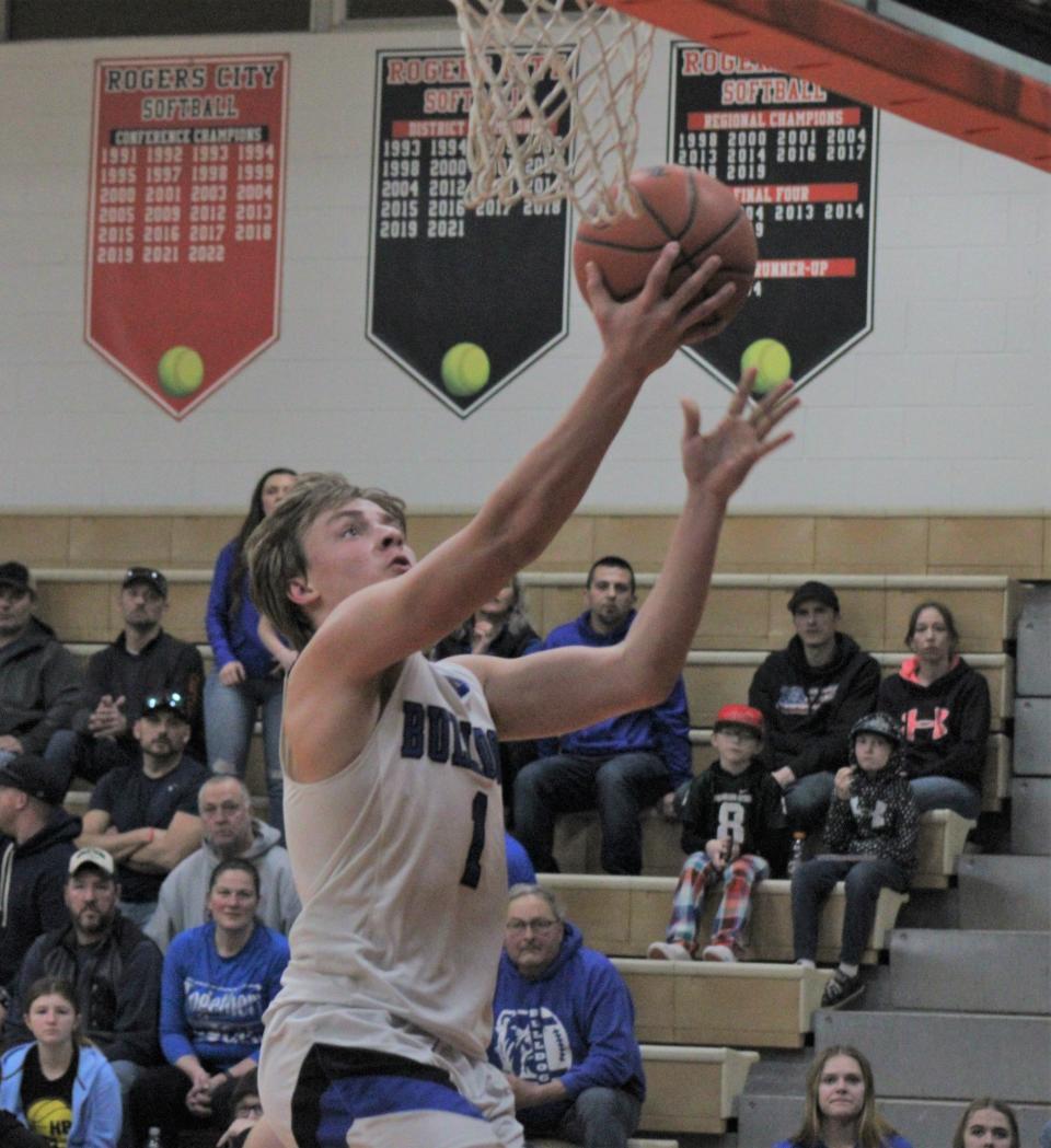 Inland Lakes junior Aidan Fenstermaker (1) makes a layup to help the Bulldogs increase their lead over Onaway in the third quarter on Friday.