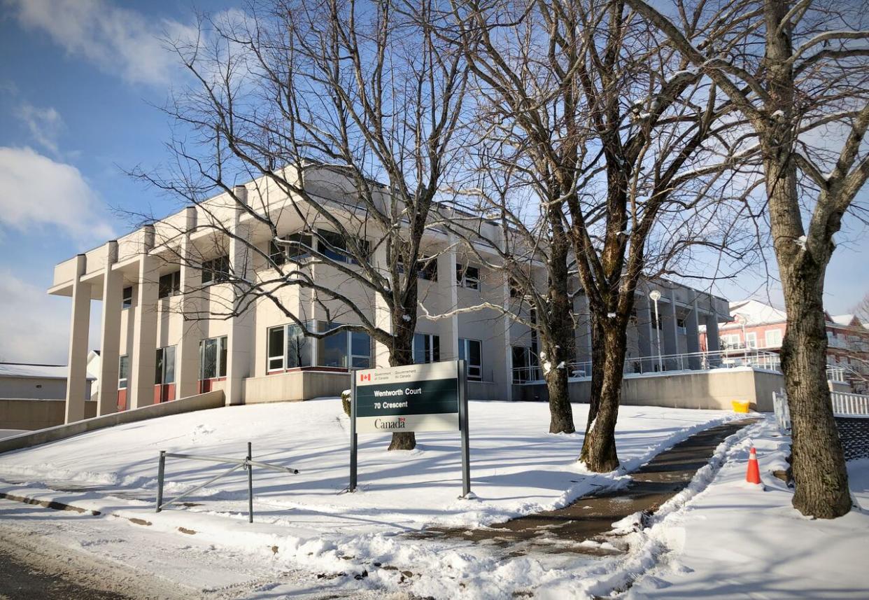 Cape Breton Regional Municipality has been told it could cost $30 million to renovate and expand the old courthouse next to Wentworth Park in Sydney, N.S., to house a new central library. (Tom Ayers/CBC - image credit)