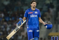 Mumbai Indians' Tim David reacts after he is given out during the Indian Premier League cricket eliminator match between Mumbai Indians and Lucknow Super Giants in Chennai, India, Wednesday, May 24, 2023. (AP Photo /R. Parthibhan)