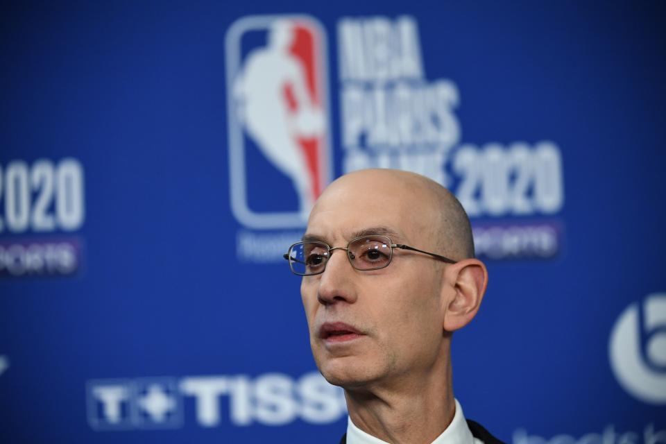 NBA commissioner Adam Silver took a hard stance on players in violation of local COVID-19 vaccine mandates. (Franck Fife/AFP via Getty Images)