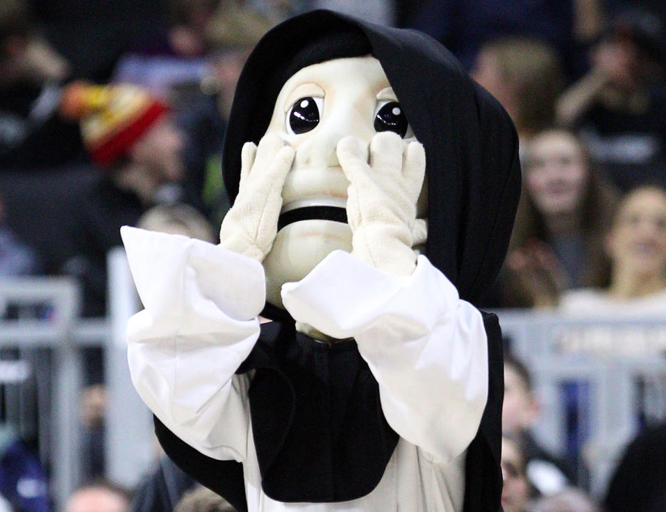 Providence College mascot Friar Dom melts faces. (Getty Images)