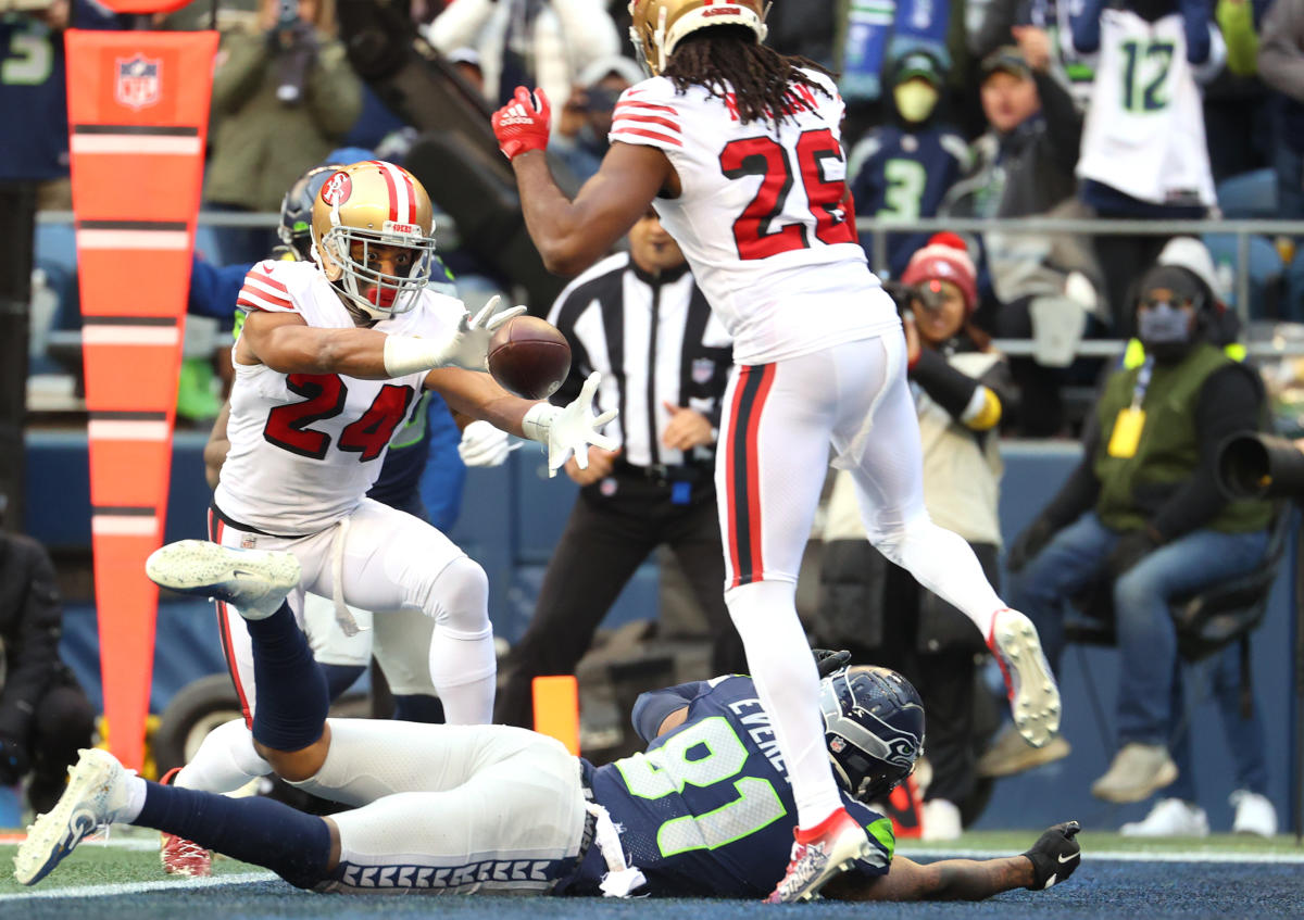 Seattle Seahawks free safety Tedric Thompson intercepts a pass intended for  Los Angeles Rams tight end Gerald Everett (not shown) during the second  half of an NFL football game, Thursday, Oct. 3