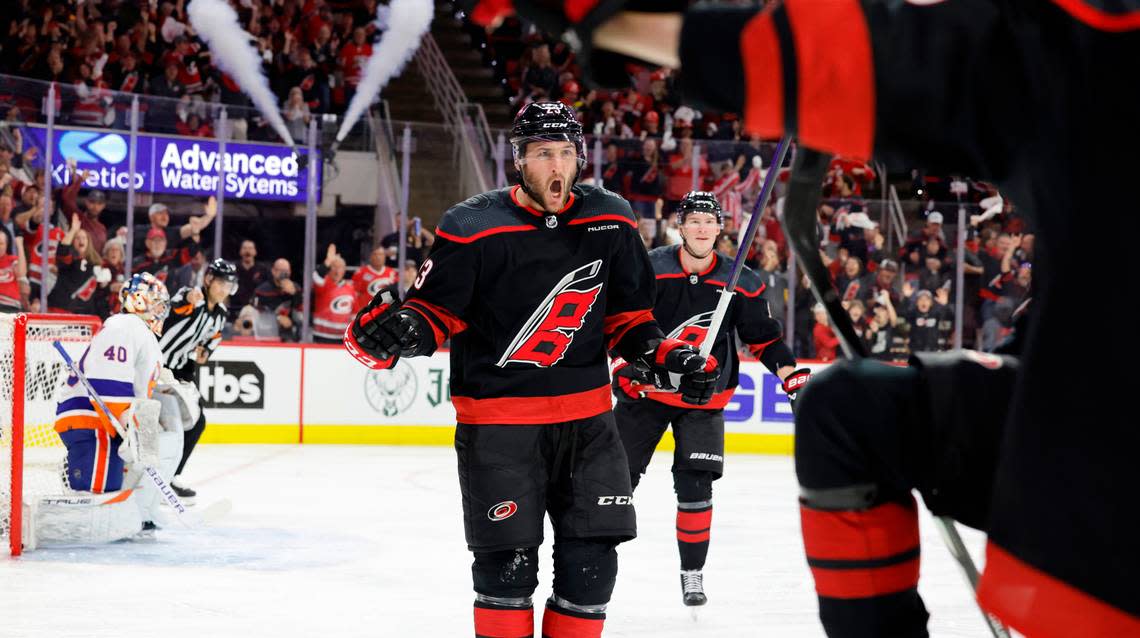 Carolina right wing Stefan Noesen (23) celebrates after Evgeny Kuznetsov scored during the first period of the Hurricanes game against the Islanders in the first round of the Stanley Cup playoffs at PNC Arena in Raleigh, N.C., Saturday, April 20, 2024.