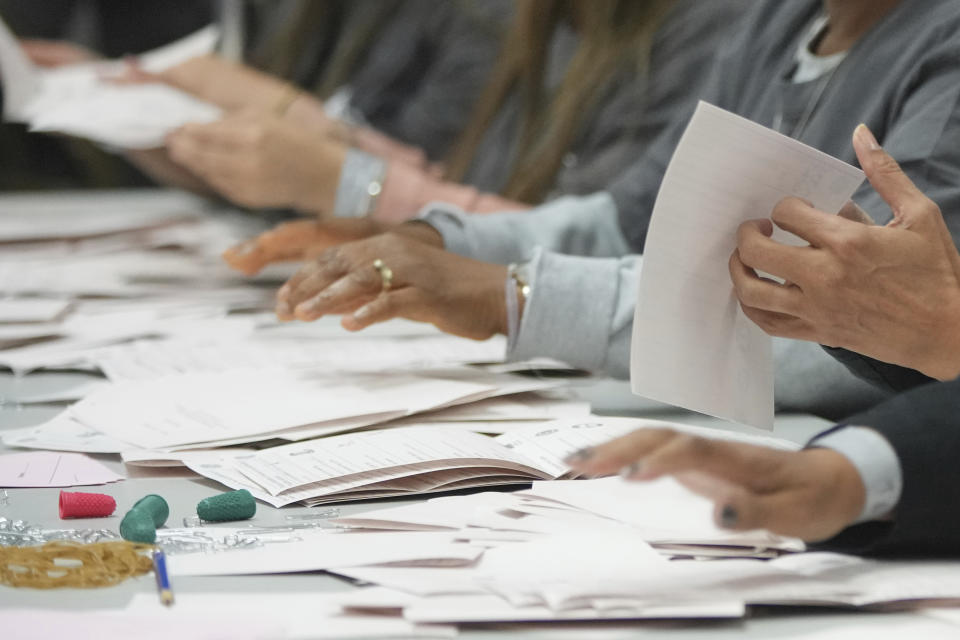 Votes are counted for the British Parliamentary constituency of Holborn and St Pancras where the Labour Party leader Keir Starmer is standing for election, in London, Thursday, July 4, 2024. Britain's Labour Party appears to be headed for a huge majority in the 2024 UK election, an exit poll suggested. The poll released moments after voting closed indicated that Labour leader Keir Starmer will be the country's next prime minister. (AP Photo/Kin Cheung)