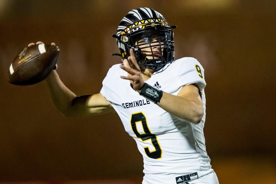 Seminole quarterback Blake Flowers throws a pass against Snyder in a Class 4A Division II bi-district game last season. Flowers is one of six offensive starters back this year.