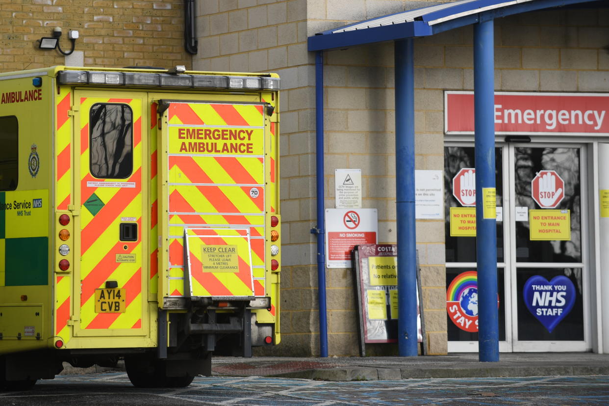 An ambulance outside an entrance to Southend University hospital in Essex. Hospitals in the county have declared a major incident and local authorities, concerned about the number of Covid-19 cases, have asked for military help to increase hospital capacity, with fears over critical care, bed capacity and staff sickness. (Photo by Joe Giddens/PA Images via Getty Images)