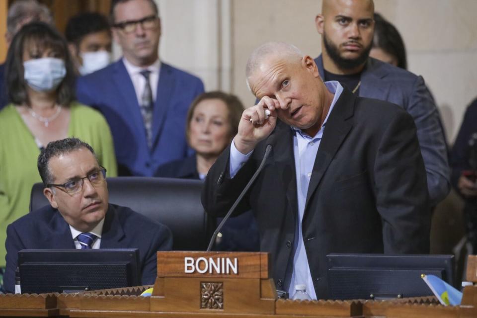 Councilmember Mike Bonin appears to wipe a tear from his eye at a council meeting