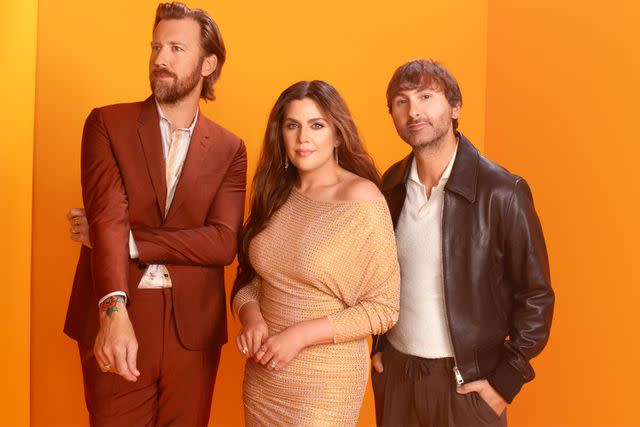 <p>Alysse Gafjken</p> Charles Kelley, Hillary Scott and Dave Haywood of Lady A