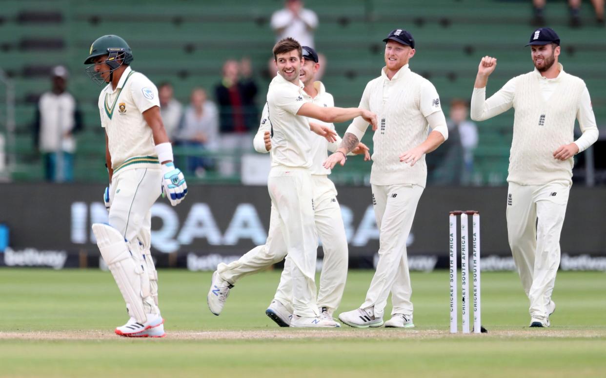 England celebrate the wicket of Zubayr Hamza - REUTERS