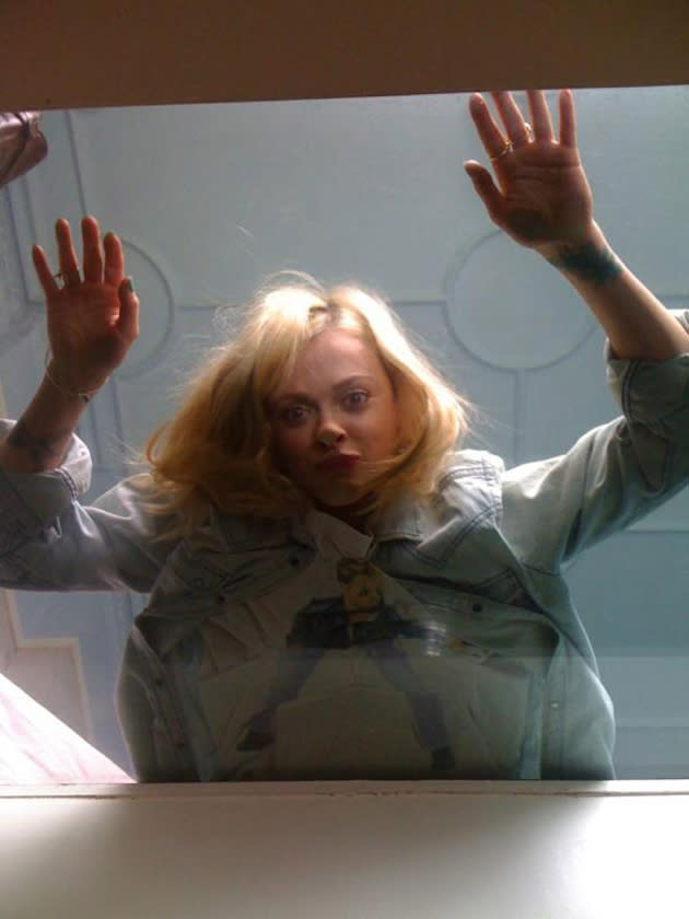 Celebrity photos: When Fearne went on a photoshoot in a house with glass floors this week, she couldn’t resist lying down and pressing her face against it for a hilarious snap. [Copyright: Fearne Cotton]