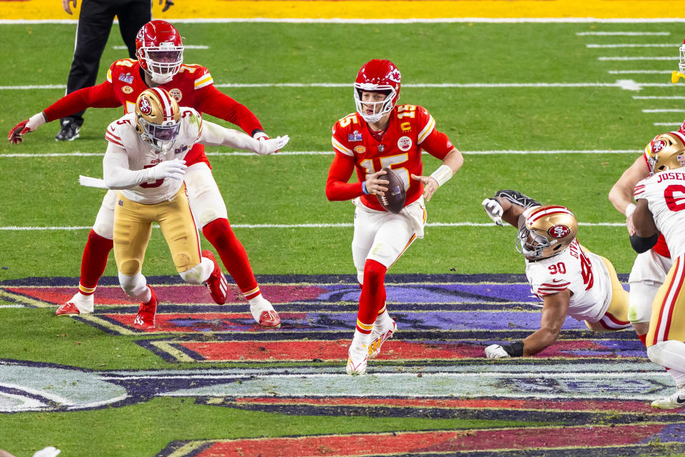 LAS VEGAS, NV - FEBRUARY 11: Kansas City Chiefs quarterback Patrick Mahomes (15) scrambles through an opening during Super Bowl LVIII between the Kansas City Chiefs and the San Francisco 49ers on Sunday February 11, 2024 at Allegiant Stadium in Las Vegas, NV. (Photo by Nick Tre. Smith/Icon Sportswire via Getty Images)