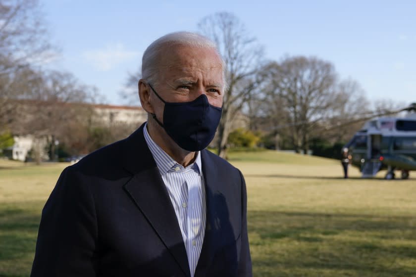 In this March 21, 2021, photo, President Joe Biden speaks with members of the press on the South Lawn of the White House in Washington. Biden is going to Ohio to showcase health insurance cost cuts at what may be the best time for Democrats to talk up the Affordable Care Act since it became law. Biden's COVID-19 relief law pumps up "Obamacare" subsidies for premiums to address longstanding problems of affordability, particularly for people with solid middle-class incomes. (AP Photo/Patrick Semansky)