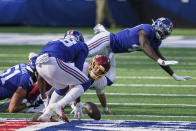 Washington Football Team quarterback Kyle Allen (8) loses control of the ball and watches New York Giants linebacker Tae Crowder (48) recover it during the second half of an NFL football game Sunday, Oct. 18, 2020, in East Rutherford, N.J. Crowder scored a touchdown on the play. (AP Photo/John Minchillo)