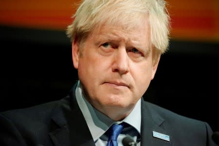 FILE PHOTO: Britain's Prime Minister Boris Johnson reacts during the Convention of the North at the Magna Centre in Rotherham