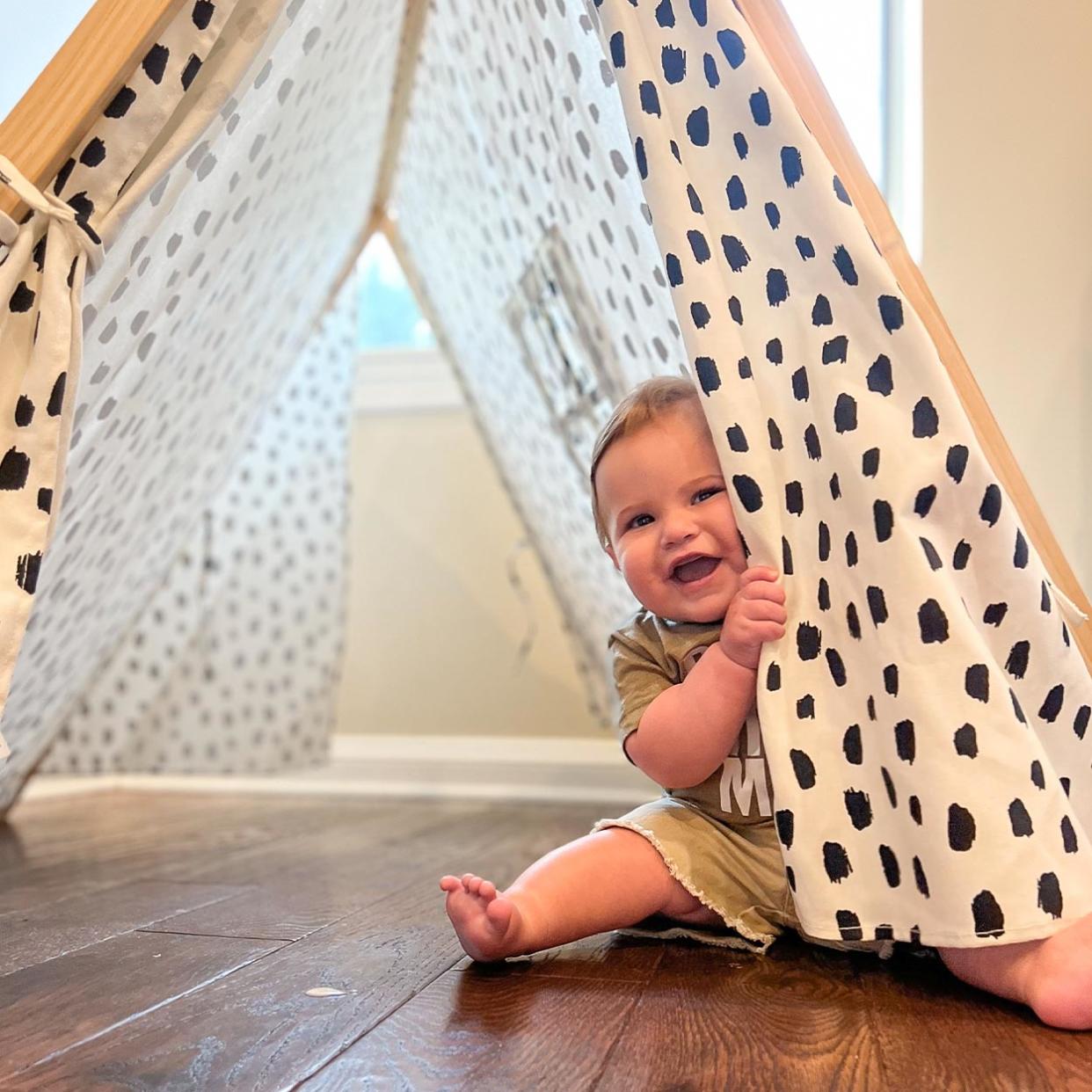 Baby in a tent (Courtesy Becca Delman)