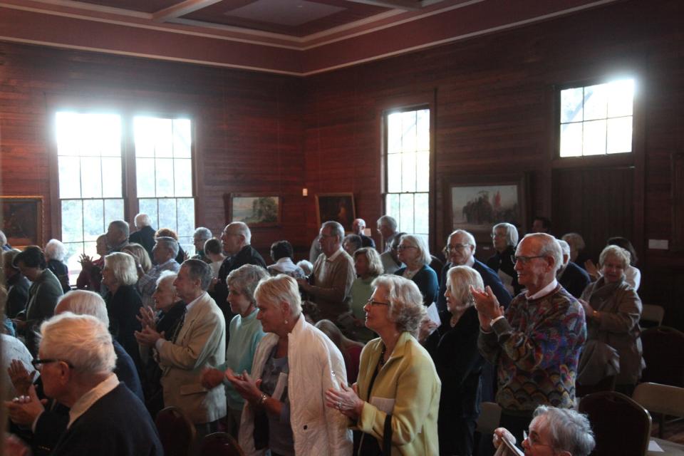 Musicians perform during the Estero Concert Series at Koreshan State Historical Site on Sunday evening. The concert was dedicated to the victims of World War II.