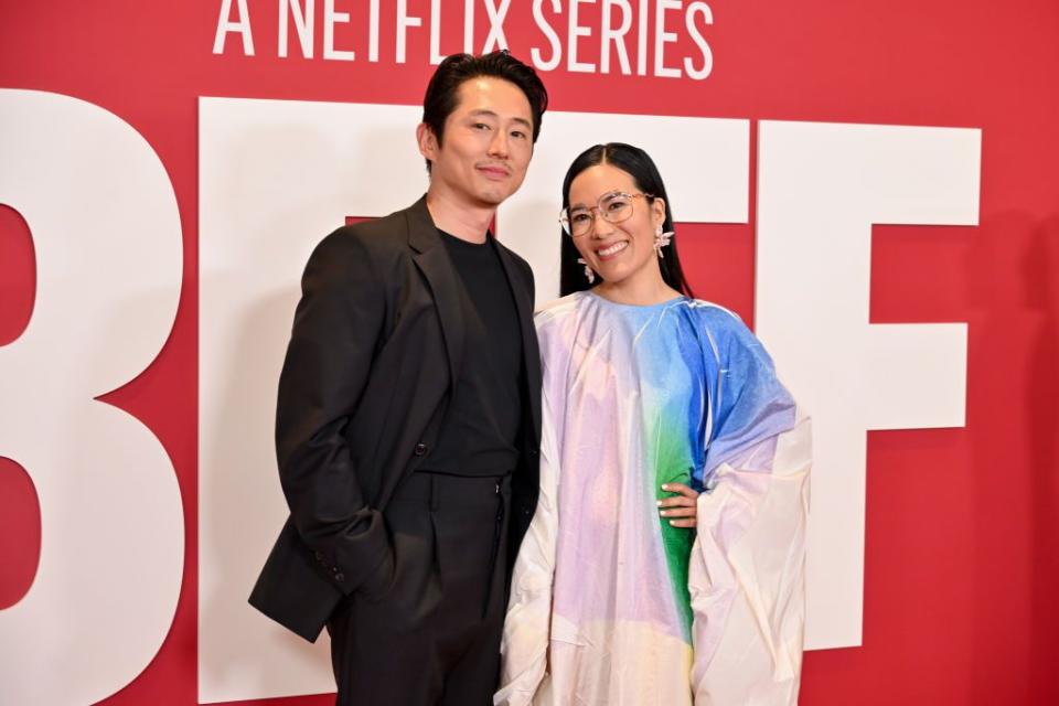 steven yeun and ali wong poing together for a photo