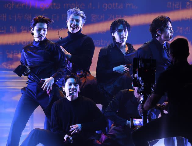 (L-R) Jimin, Jungkook, RM, Suga and V of BTS perform onstage during the 64th Annual Grammy Awards at MGM Grand Garden Arena on April 3, 2022, in Las Vegas.