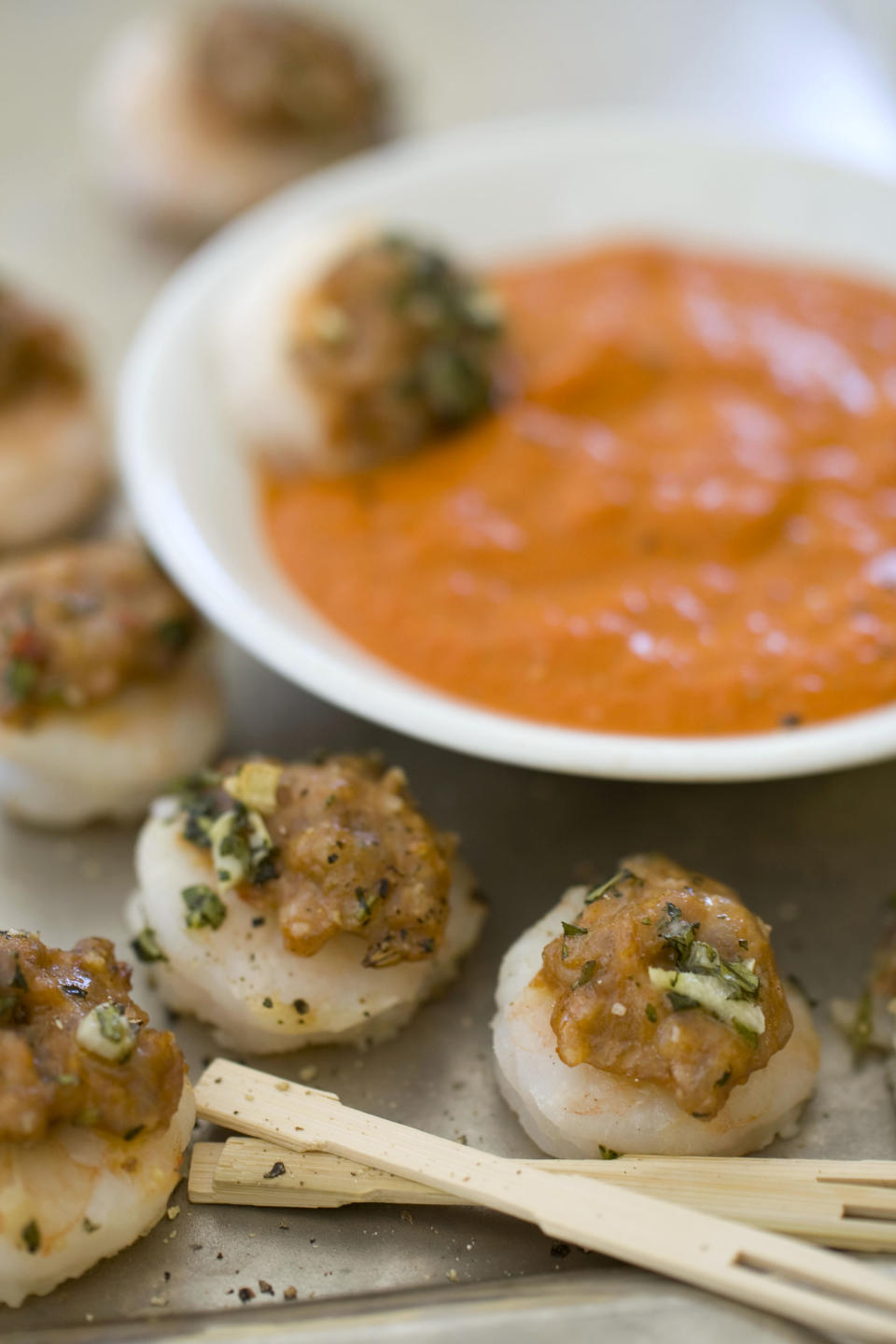 This Nov. 4, 2013 photo shows Italian surf and turf with roasted red pepper sauce in Concord, N.H. (AP Photo/Matthew Mead)