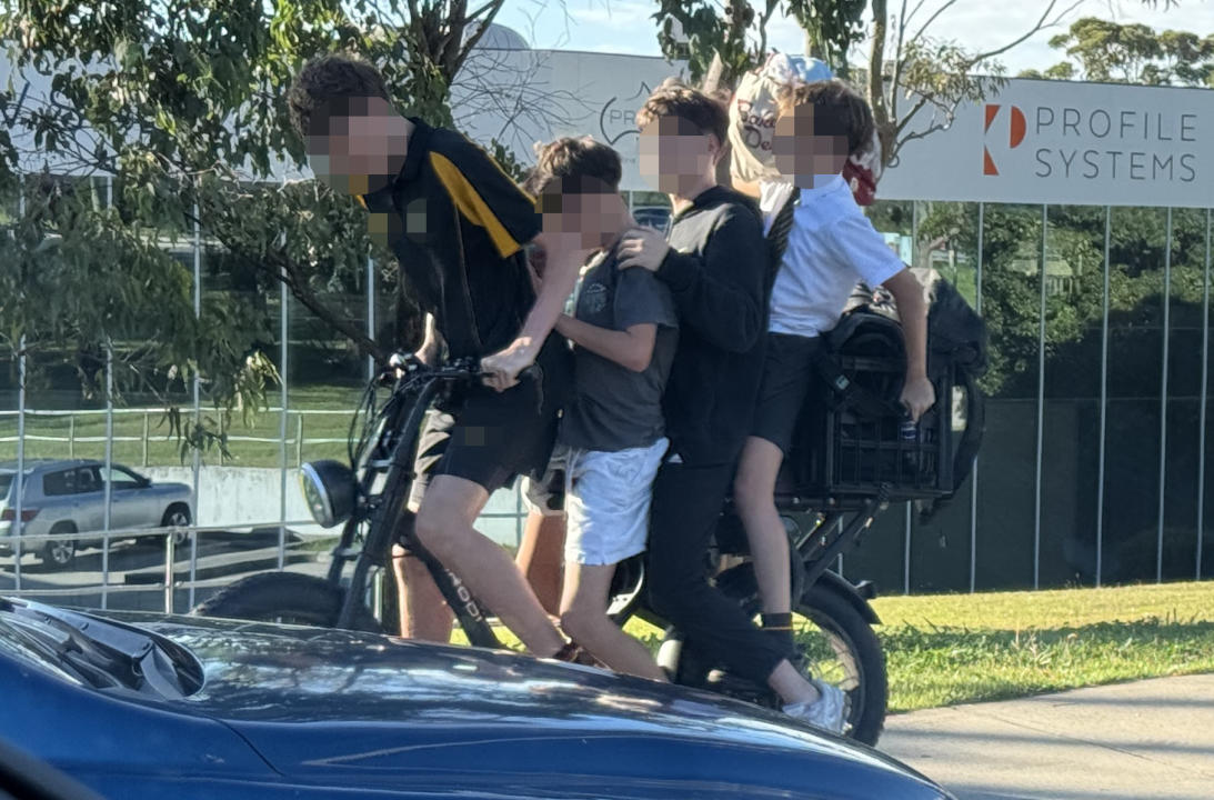Four school kids loaded onto an e-bike. Source: Supplied