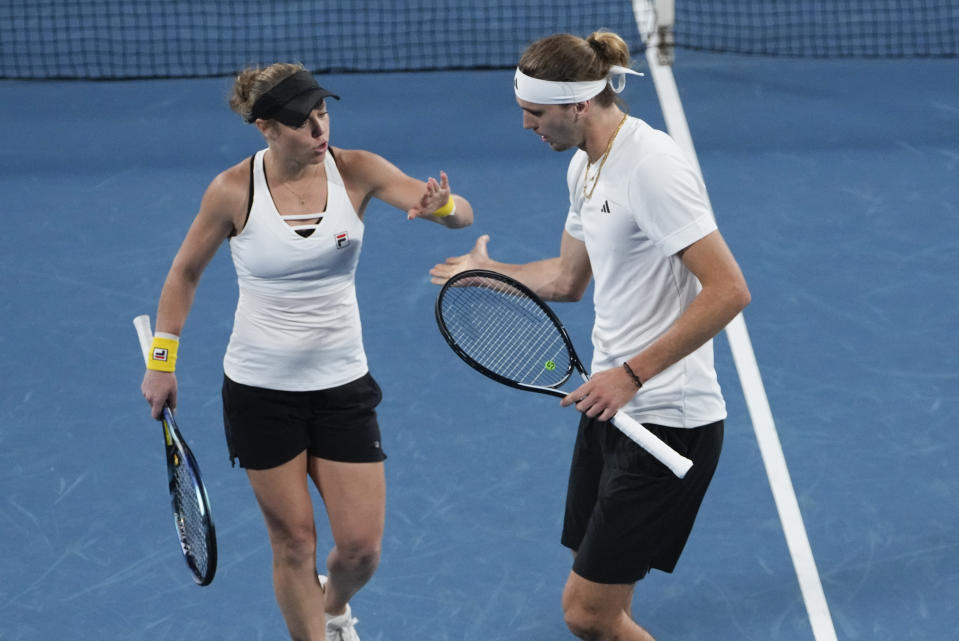 Germany's Laura Siegemund and Alexander Zverev react during their doubles quarterfinal match against Maria Sakkari and Petros Tsitsipas of Greece at the United Cup in Sydney, Australia, Friday, Jan. 5, 2024. (AP Photo/Mark Baker)