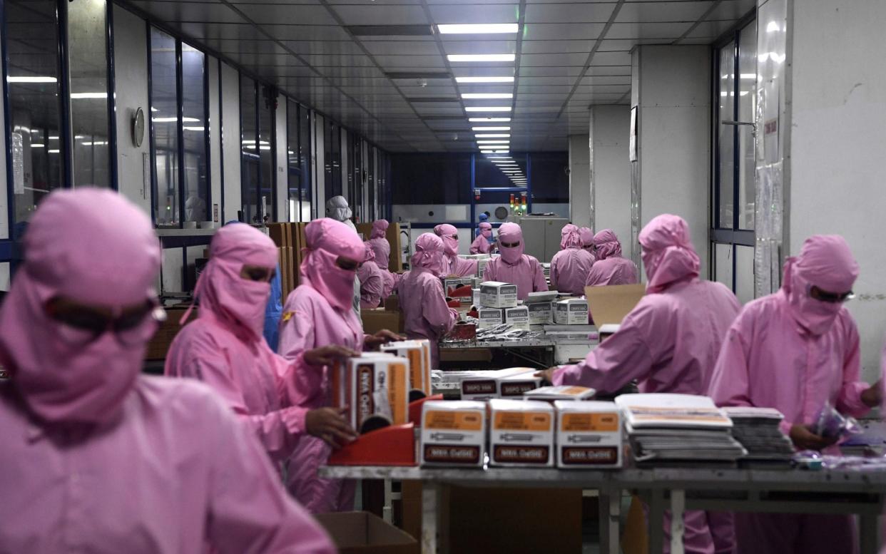 India's biggest syringe manufacturer is ramping up its production to churn out a billion units, anticipating a surge in demand as the global race to find a COVID-19 coronavirus vaccine heats up - AFP