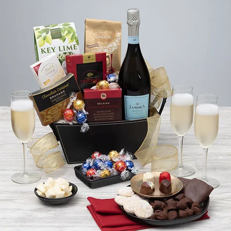 <p><a href="https://go.redirectingat.com?id=74968X1596630&url=https%3A%2F%2Fwww.gourmetgiftbaskets.com%2FChampagne-And-Truffles-Gift-Basket.asp&sref=https%3A%2F%2Fwww.esquire.com%2Ffood-drink%2Fg38036473%2Fbest-wine-gift-baskets%2F" rel="nofollow noopener" target="_blank" data-ylk="slk:Shop Now;elm:context_link;itc:0;sec:content-canvas" class="link rapid-noclick-resp">Shop Now</a></p><p>Champagne & Truffles Gift Basket - Prosecco </p><p>$119.99</p><p>gourmetgiftbaskets.com</p>