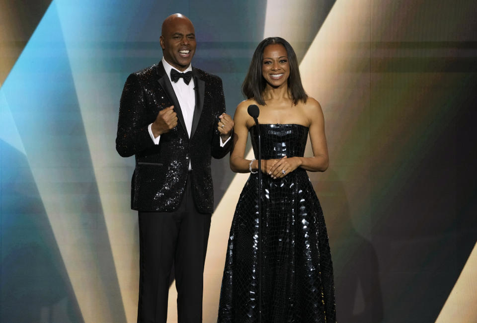 Hosts Kevin Frazier, left, and Nischelle Turner appear during the 50th Daytime Emmy Awards on Friday, Dec. 15, 2023, at the Westin Bonaventure Hotel in Los Angeles. (AP Photo/Chris Pizzello)