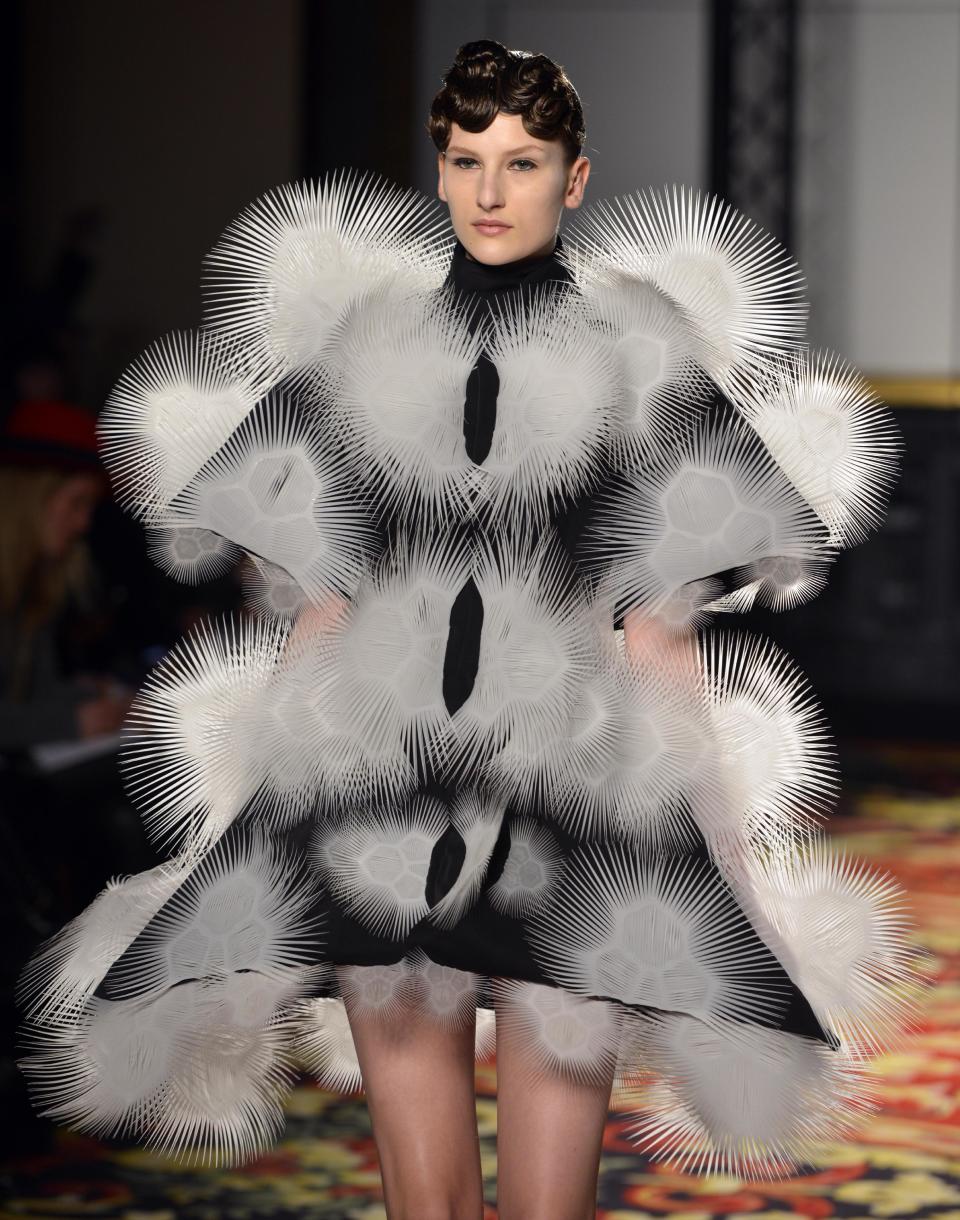 A model wears a creation by Dutch fashion designer Iris van Herpen for her Spring Summer 2013 Haute Couture fashion collection, presented in Paris, Monday, Jan.21, 2013. (AP Photo/Benjamin Girette)