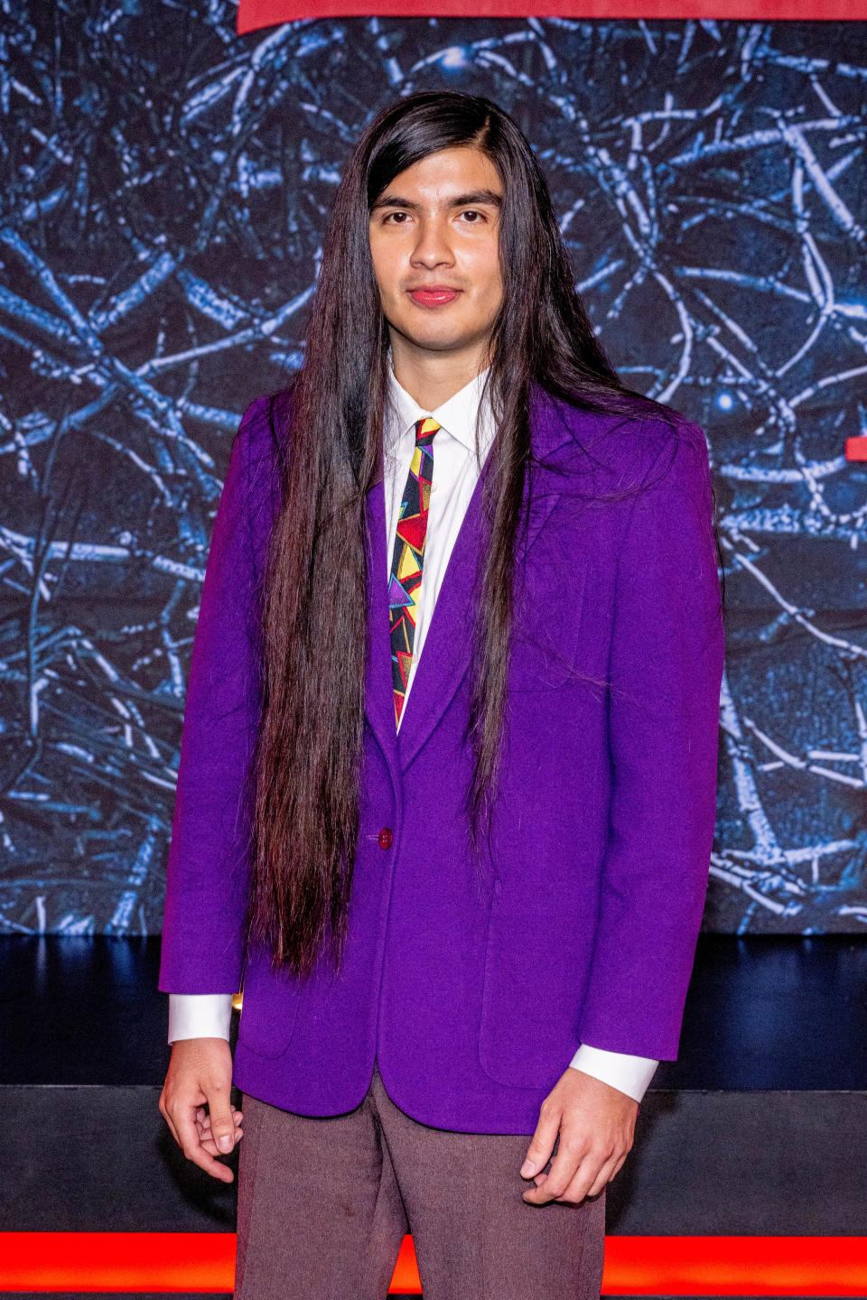 Eduardo Franco in a suit on the red carpet