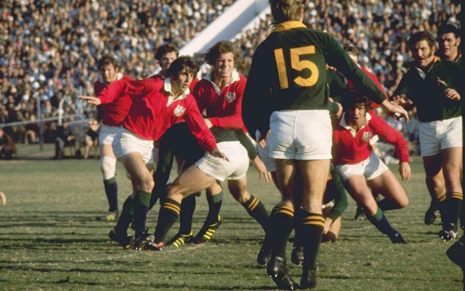 Ian McGeechan of the British Lions (left) in action against South Africa in 1974 - GETTY IMAGES