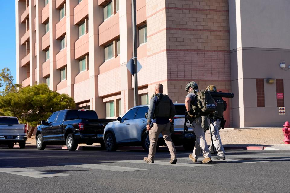 Las Vegas Metro Police respond to a shooting reported on the University of Nevada, Las Vegas, campus, Wednesday, Dec. 6, 2023, in Las Vegas (AP)