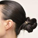 <div class="caption-credit"> Photo by: Shuji Kobayashi</div><div class="caption-title">Use a Mascara Wand to Smooth Stray Hairs</div>After you've secured your undo, spritz a clean mascara wand with hairspray and comb up from the nape of the neck toward the bun to smooth down any stray hairs. Also do this above the ears. "Only the bun should have a messy texture," says stylist Mark Townsend. <br> <br> <b>More from MarieClaire.com: <br></b> <b><a rel="nofollow noopener" href="http://www.marieclaire.com/sex-love/relationship-issues/cheap-date-ideaslink=emb&dom=yah_life&src=syn&con=blog_marieclaire&mag=mar" target="_blank" data-ylk="slk:50 Cheap Date Ideas;elm:context_link;itc:0;sec:content-canvas" class="link ">50 Cheap Date Ideas</a> <br></b> <b><a rel="nofollow noopener" href="http://www.marieclaire.com/sex-love/advice/tips/men-dating-secrets?link=emb&dom=yah_life&src=syn&con=blog_marieclaire&mag=mar" target="_blank" data-ylk="slk:20 Secrets Men NEVER Tell Women;elm:context_link;itc:0;sec:content-canvas" class="link ">20 Secrets Men NEVER Tell Women</a></b> <br>