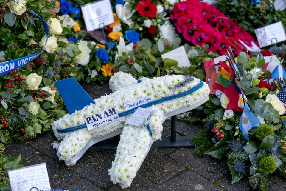 Wreaths and floral tributes laid during a ceremony to mark the 35th anniversary of the Lockerbie bombing (Jane Barlow / PA)