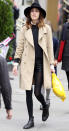 <b>Alexa Chung</b><br><br>Alexa Chung keeps it casual on her shopping trip with a beige double breasted trench mackintosh, black jumper, leather hotpants and black tights. She adds her unique brand on indie with her trendy hat.<br><br> © REX