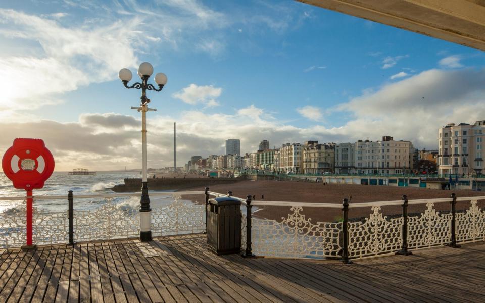 Sunny afternoon on Brighton Pier, England.