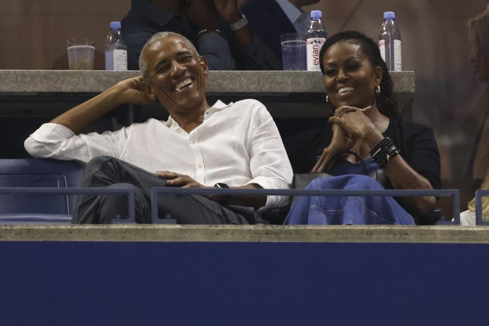 Former President Barack Obama and his wife Michelle attend the U.S. Open tennis championships, Monday, Aug. 28, 2023, in New York. (AP Photo/Jason DeCrow)