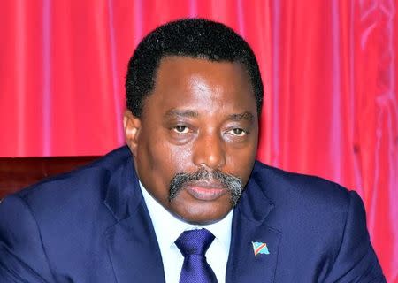 Democratic Republic of the Congo's President Joseph Kabila meets some members of the opposition parties inside his office at the Palais de la Nation building in Gombe municipality in the capital Kinshasa, Democratic Republic of the Congo April 3, 2017. REUTERS/Kenny Katombe/Files