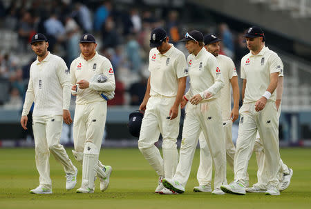 Cricket - England vs Pakistan - First Test - Lord's Cricket Ground, London, Britain - May 24, 2018 England's players walk off at the end of the days play Action Images via Reuters/John Sibley