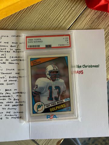 <p>Lindsey Moore</p> The Dan Marino rookie card that Lindsey Moore gave as a present to her father