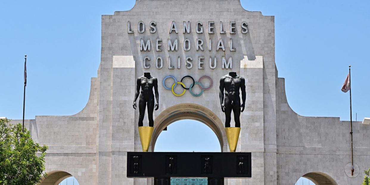 The Los Angeles Coliseum will host the Olympic Opening and Closing ceremony and track and field events for a third time. (Photo by Frederic J. Brown/AFP/Getty Images)