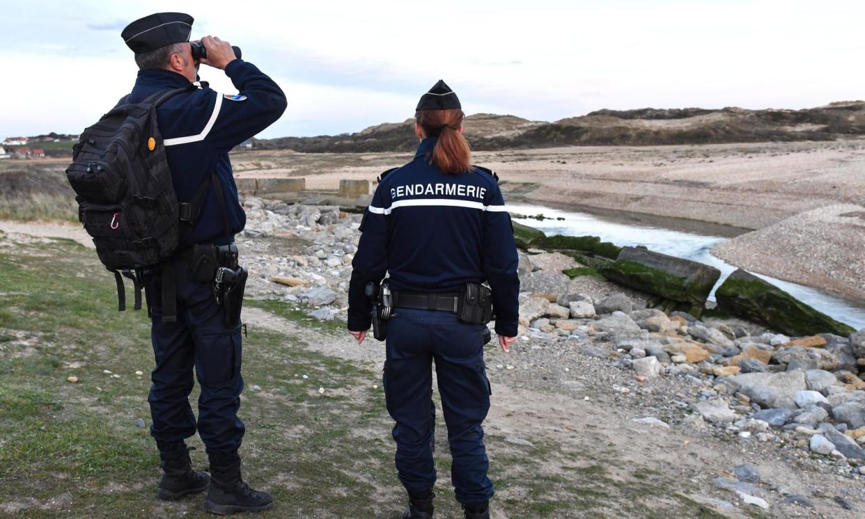 <span>French gendarmes patrolling the beaches of the northern French coast.</span><span>Photograph: Denis Charlet/AFP/Getty Images</span>
