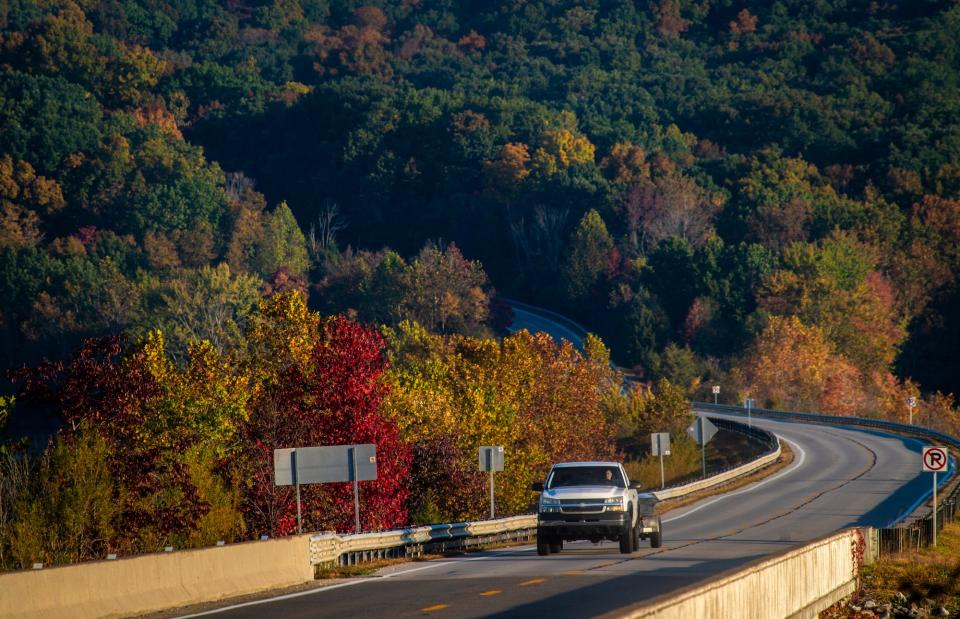 A truck crosses the Ind. 446 bridge at Lake Monroe earlier this month. The hills behind the truck could become part of the Benjamin Harrison National Recreation Area.