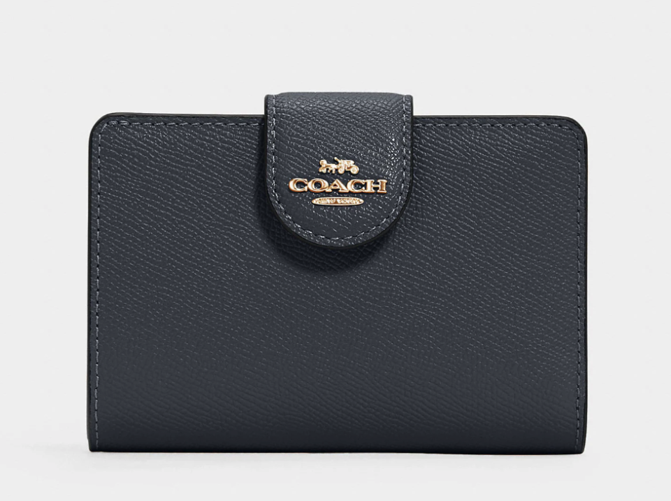 Medium Corner Zip Wallet. Image via Coach Outlet.