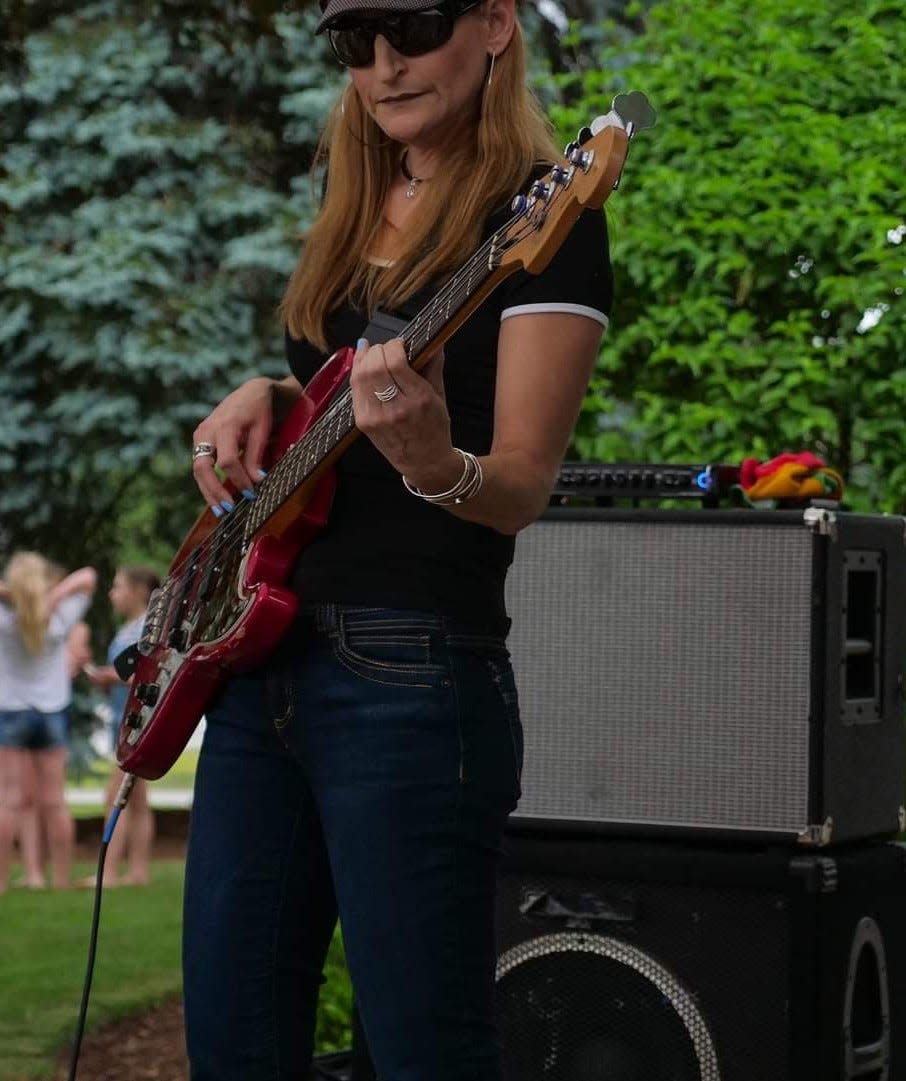 Hull resident Julie Feola is a bass player and one of the founders of the reggae band High Hopes.