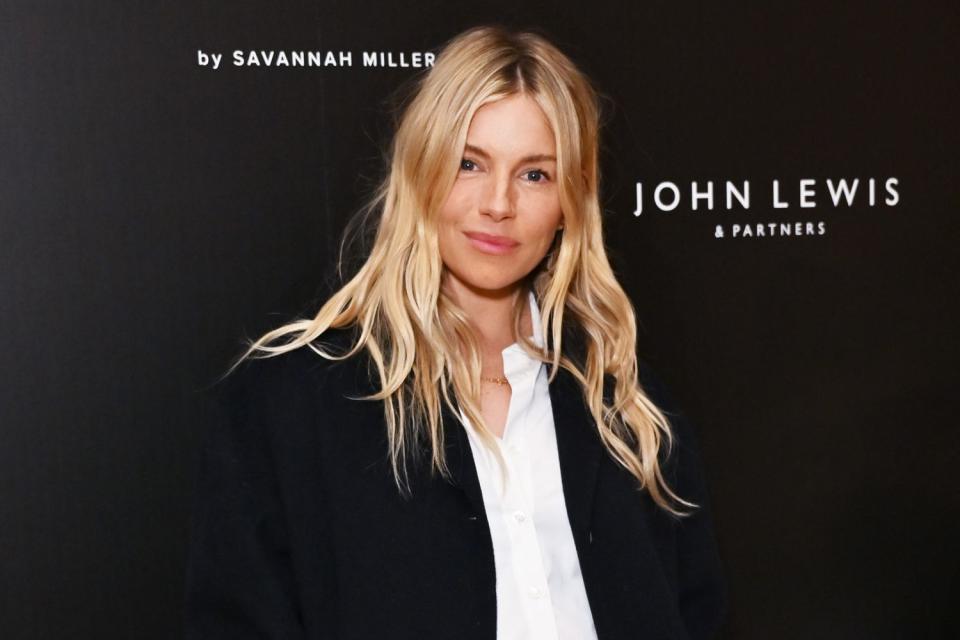 <p>Jed Cullen/Dave Benett/Getty</p> Sienna Miller attends the London launch of Vivere by Savannah Miller at Luci on Nov. 20, 2023