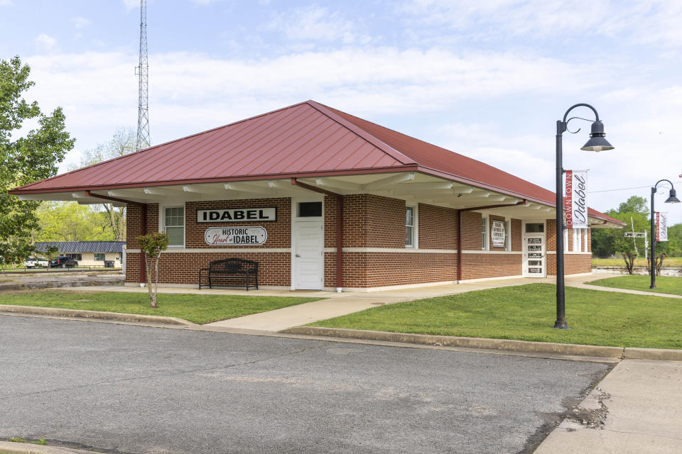 A view is seen of the Idabel historic train station and Chamber of Commerce on Friday, April 21, 2023. The growing optimism of McCurtain County's tourism boom over the last two decades took a gut punch last week when the local newspaper identified several county officials, including the sheriff and a county commissioner, who were caught on tape discussing killing journalists and lynching Black people. (AP Photo/Alonzo Adams)